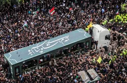 پیکر رئیس جمهور شهید در آستانه ورود به حرم امام هشتم